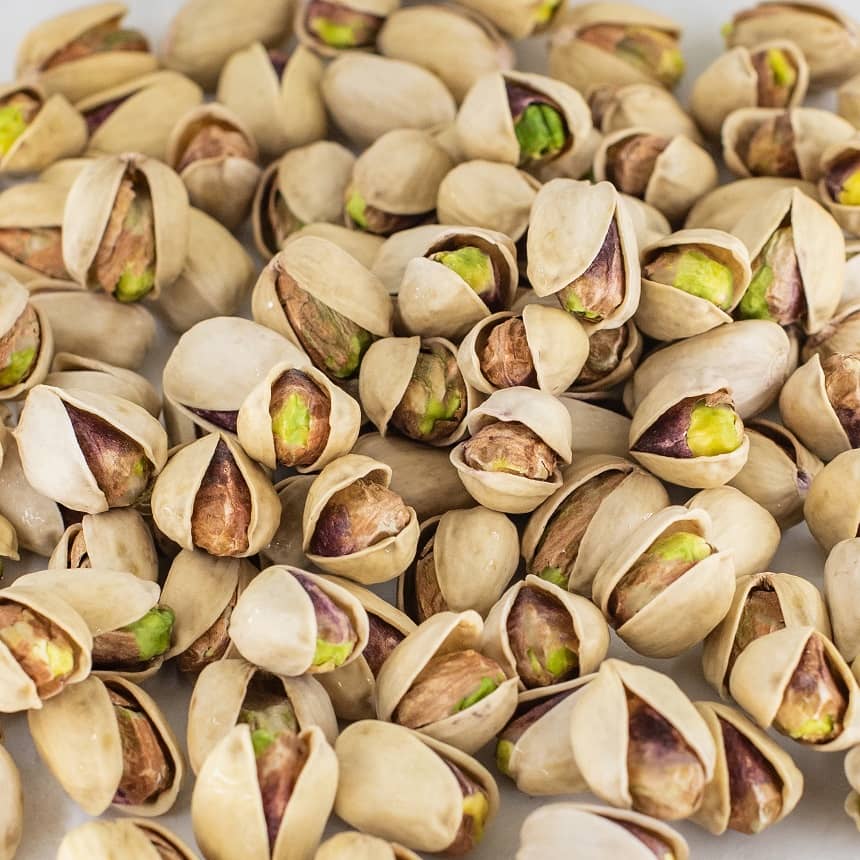 Close-up of naturally split in-shell pistachios